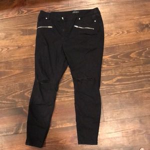 Skinny legged black jeans